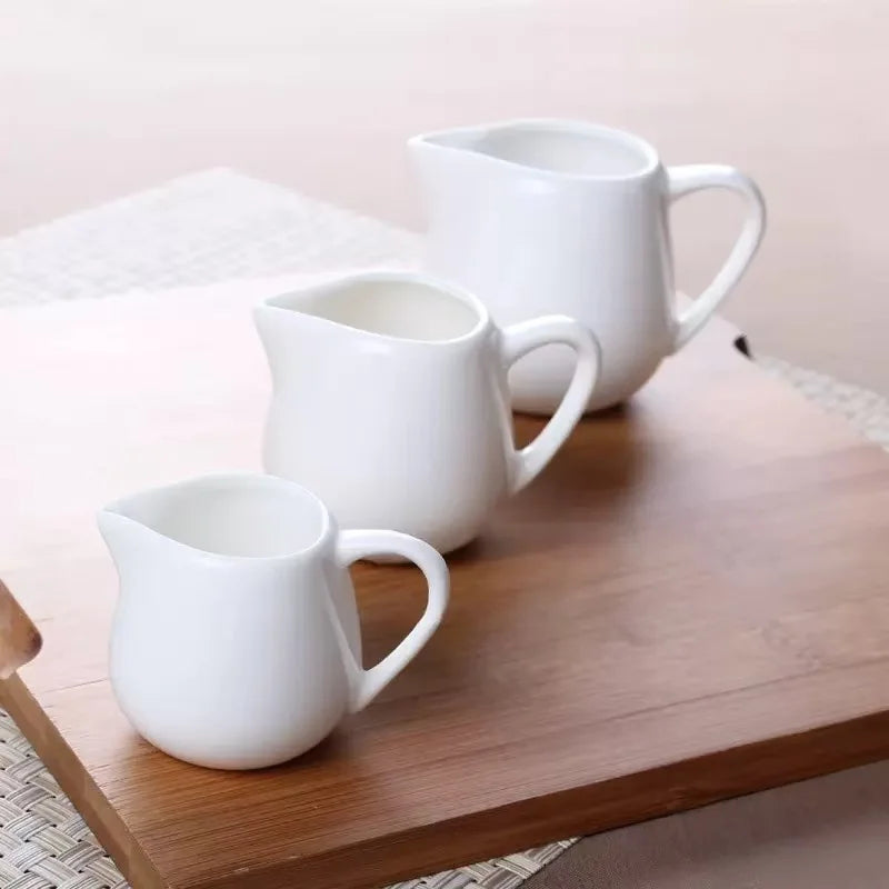 Jarra de leche de cerámica YWDL de 50/100/220 ml para café espresso, crema, cocina, salsa, taza de servicio, jarra resistente al calor, blanca